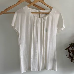 Pleated short sleeve blouse.